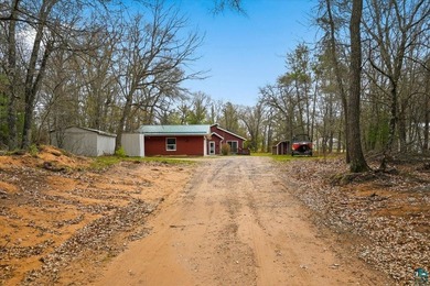 Discover this inviting 4-bedroom, 1-bath home on 3.26 wooded - photo 7