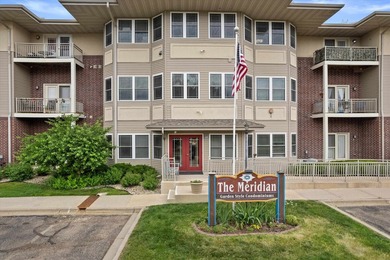 Welcome home to this bright and airy 55+ condominium in the - photo 1
