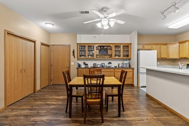 Welcome home to this bright and airy 55+ condominium in the - photo 3