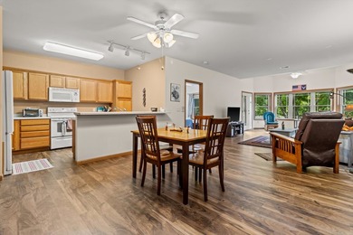 Welcome home to this bright and airy 55+ condominium in the - photo 5