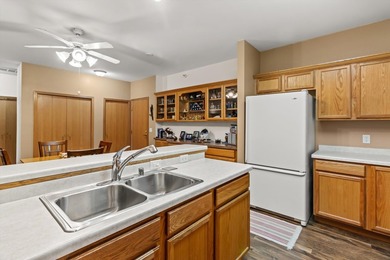 Welcome home to this bright and airy 55+ condominium in the - photo 9