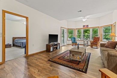 Welcome home to this bright and airy 55+ condominium in the - photo 10