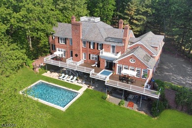 This stately, European-style brick home with striking - photo 1