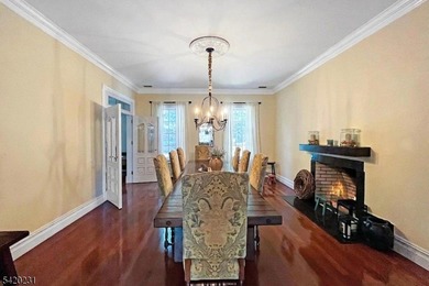 This stately, European-style brick home with striking - photo 4