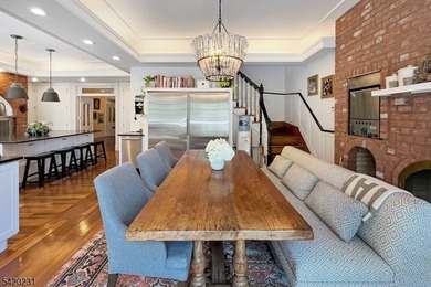 This stately, European-style brick home with striking - photo 7