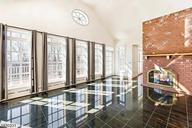 This stately, European-style brick home with striking - photo 8