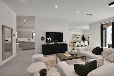 This two-story residence features five bedrooms, six and a half - photo 3