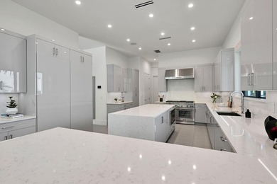 This two-story residence features five bedrooms, six and a half - photo 4