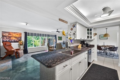 Adorable home ideally located just three lots from the river and - photo 5