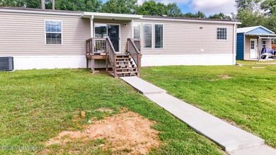 Escape to your own private lakeside retreat! Nestled on 1.3 - photo 12