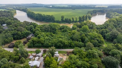 Discover your own riverfront retreat with this 2+/- acre tract - photo 13
