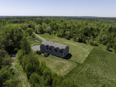 The long scenic driveway leads to the heart of the property