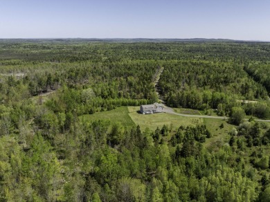 The long scenic driveway leads to the heart of the property