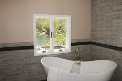 Updated lake front, new kitchen, 4 new baths, 3 bedrooms + more! - photo 14