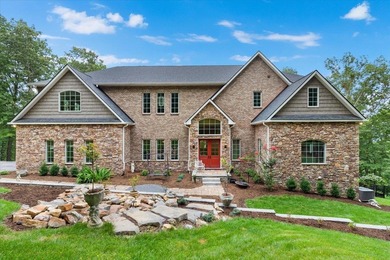 Beautiful nearly new custom built brick &amp; stone home overlooking