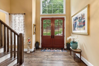 Beautiful nearly new custom built brick & stone home overlooking