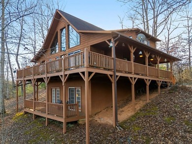 This FULLY FURNISHED two-bedroom, three-bathroom mountain chalet - photo 1