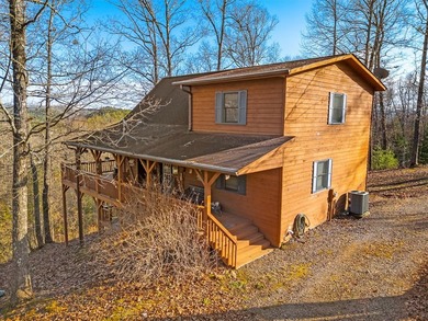 This FULLY FURNISHED two-bedroom, three-bathroom mountain chalet - photo 2