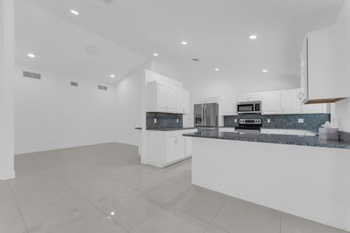 This stunning 4-bedroom, 2-bath pool home in the heart of Coral - photo 14