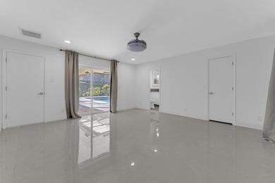 This stunning 4-bedroom, 2-bath pool home in the heart of Coral - photo 22