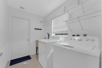This stunning 4-bedroom, 2-bath pool home in the heart of Coral - photo 37