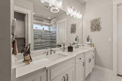 Stunning 4-bedroom, 3-bath modern farmhouse in the gated