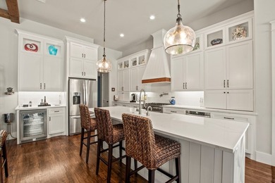 Stunning 4-bedroom, 3-bath modern farmhouse in the gated