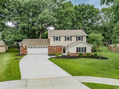 Nestled on a spacious .80-acre cul-de-sac lot in the desirable - photo 1