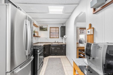 Welcome to 1835 Narragansett Ave, a home defined by decades of - photo 12