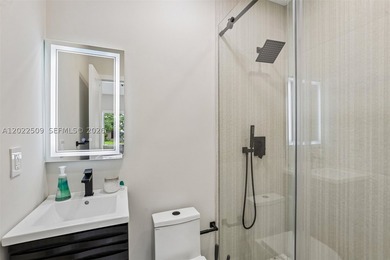 Completely remodeled 4 bedroom, 3 bath waterfront home in the - photo 22