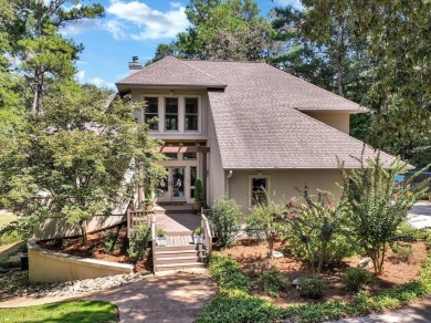 WONDERFUL HOME NESTLED IN THE WOODS ALONG TERRI PINES GOLF