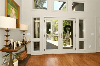 WONDERFUL HOME NESTLED IN THE WOODS ALONG TERRI PINES GOLF