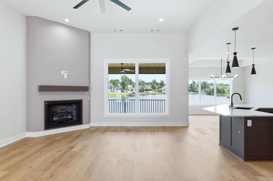 Wake up each day to breathtaking lake views in this exceptional - photo 6