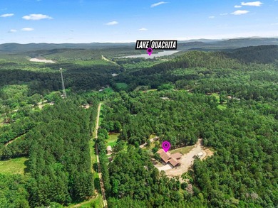 JUST MINUTES FROM LAKE OUACHITA, THIS STUNNING 12.6-ACRE - photo 2