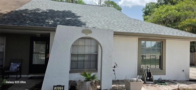 Large 2 bedroom, 2 bathroom canal waterfront home. Tile and wood - photo 3