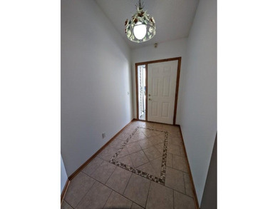 Very well cared for one-level townhome with lake access AND boat