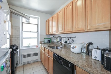 Step into this extra spacious one-bedroom corner unit offering - photo 16