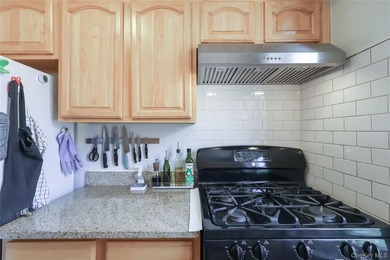 Step into this extra spacious one-bedroom corner unit offering - photo 17