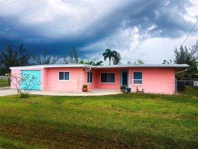 Experience this mid-century waterfront property in Punta Gorda - photo 3