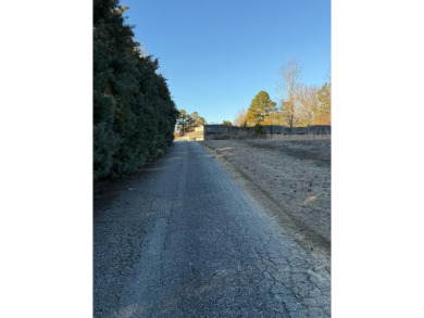 Want to be on the Golf Course? Take a look at this .72 Acre Lot