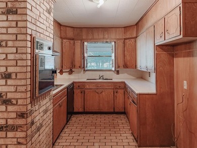 Discover the possibilities with this 4-bedroom, 2-bath home