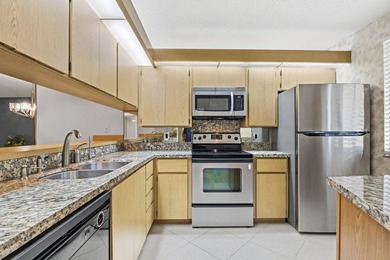 This inviting first-floor, two-bedroom, two-bath condo offers a - photo 4