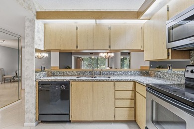 This inviting first-floor, two-bedroom, two-bath condo offers a - photo 5
