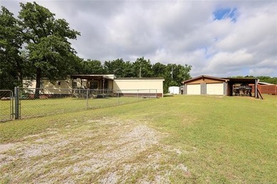 1.6 acres near Arbuckle Lake! This 3 bed, 2 bath mobile home - photo 4