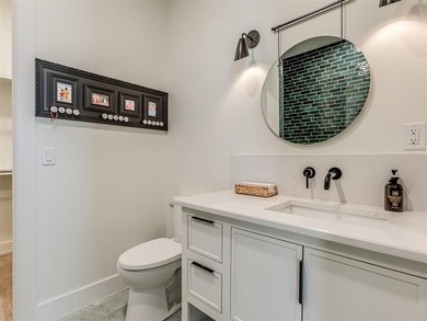 Welcome to 107 Lower Greenway, a rare four-story retreat in the - photo 33
