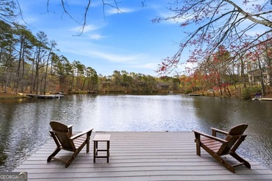 Tucked away on a quiet cove in the highly sought after Lake - photo 2