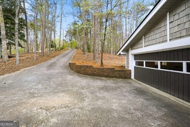 Tucked away on a quiet cove in the highly sought after Lake - photo 4
