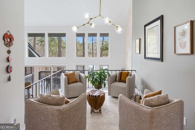 Tucked away on a quiet cove in the highly sought after Lake - photo 6