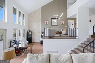 Tucked away on a quiet cove in the highly sought after Lake - photo 10