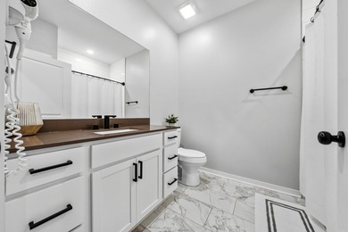 Welcome to this beautiful 3-bedroom, 2.5-bath lakefront retreat - photo 21